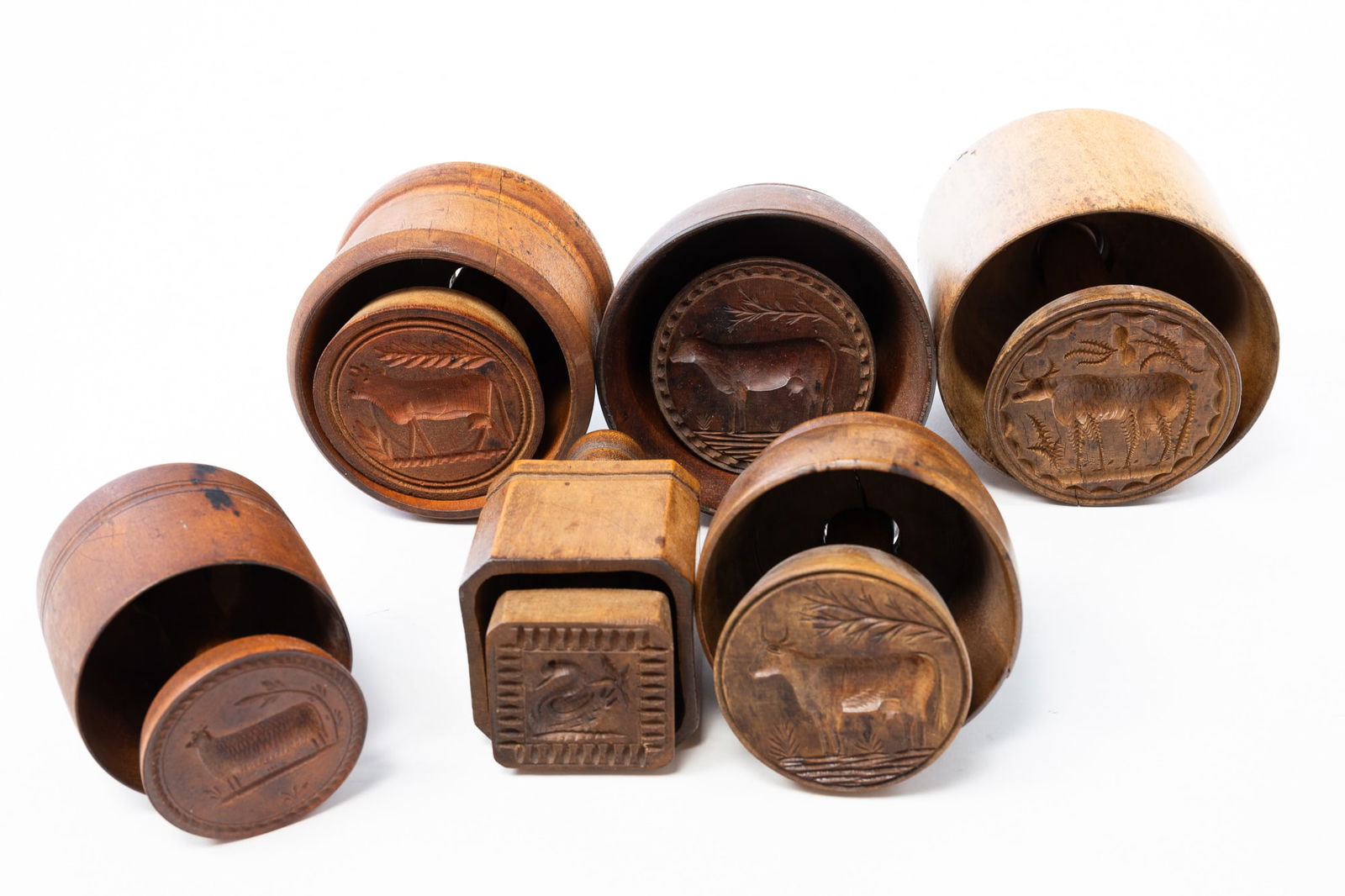 SIX AMERICAN ANIMAL MOTIF CASED BUTTER MOLDS OR PRINTS. (1 of 2)