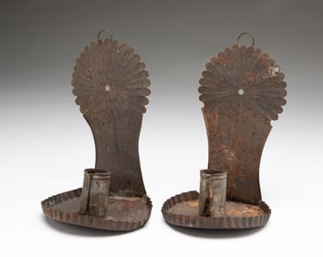 PAIR OF AMERICAN STAMPED AND CRIMPED TIN CANDLE SCONCES.