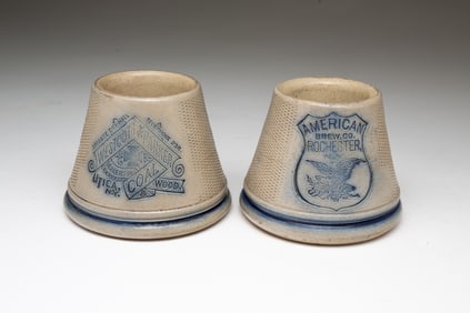 TWO AMERICAN COBALT-DECORATED STONEWARE ADVERTISING MATCH HOLDERS AND STRIKERS.