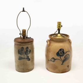 TWO AMERICAN STONEWARE JARS WITH COBALT DECORATION.