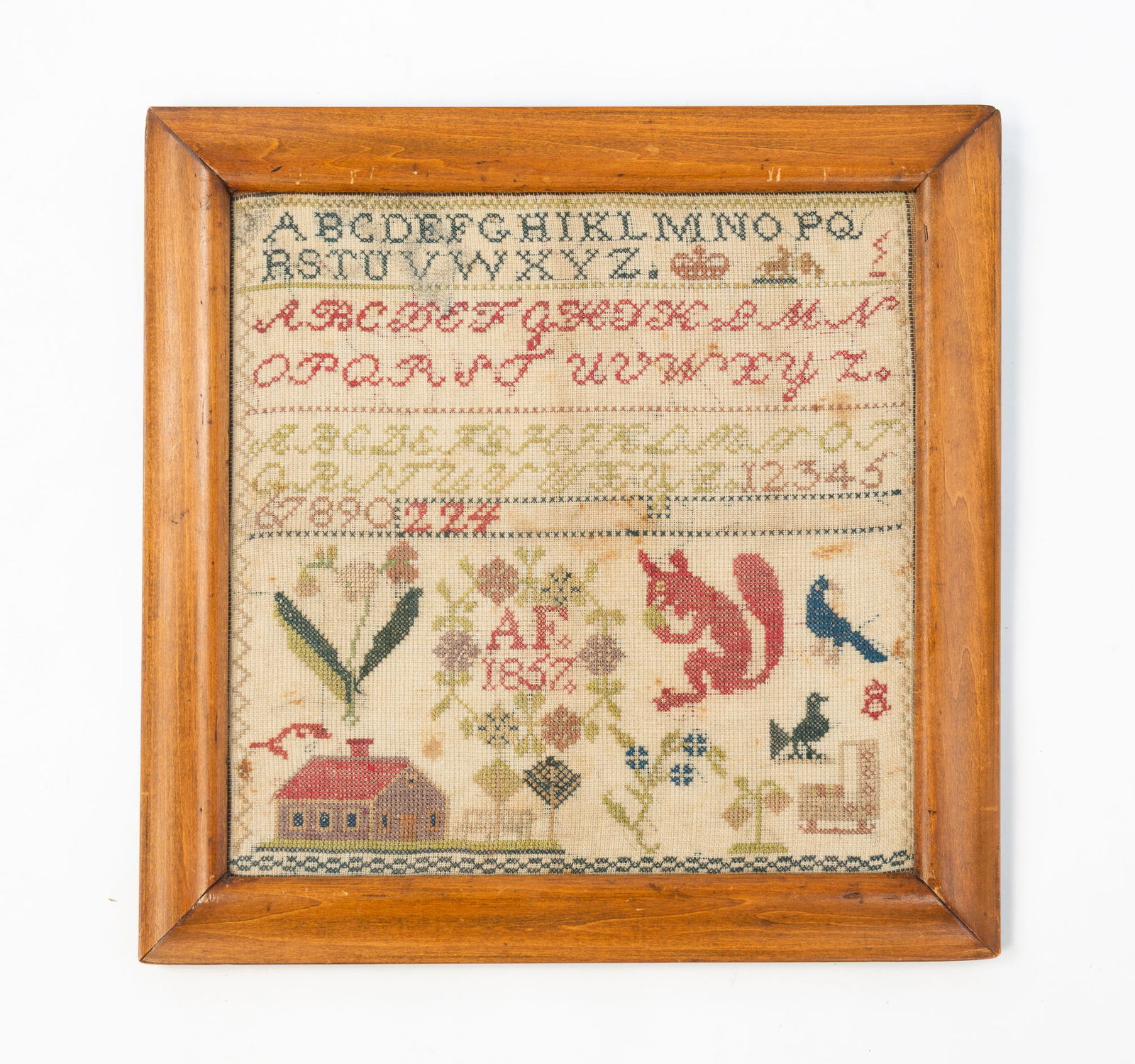 NEEDLEWORK SAMPLER WITH SQUIRREL, DATED 1857. (1 of 4)
