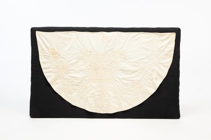 AMERICAN TRAPUNTO NEEDLEWORK DEMILUNE TABLE COVERING.
