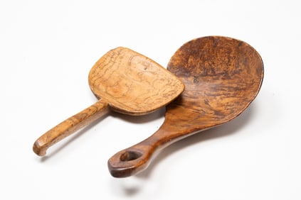 TWO AMERICAN CARVED HARDWOOD PADDLES OR SCOOPS.