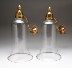 A PAIR OF WALL SCONCES WITH BLOWN GLASS SHADES.