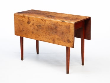 AMERICAN HEPPLEWHITE RED-WASHED MAPLE DROP-LEAF TABLE.
