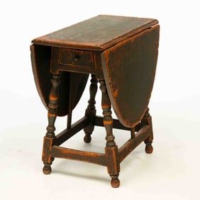 DAVID T. SMITH & CO. (MORROW, OHIO) WILLIAM AND MARY STYLE TIGER MAPLE BUTTERFLY TABLE.
