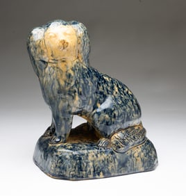 OHIO YELLOWWARE SEATED SPANIEL.