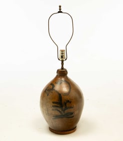 HIGGANS AND COMPANY, CLEVELAND, OHIO STONEWARE JUG.