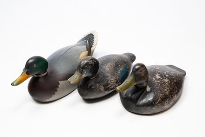 THREE CARVED AND PAINTED WORKING DUCK DECOYS, INCLUDING DON BREWER, CONRAD JACOB KLOPPING, AND K.