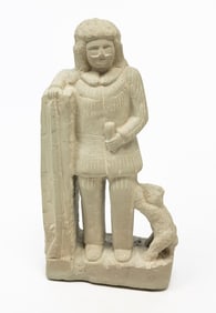 ERNEST "POPEYE" REED (OHIO, 1919-1985) FOLK ART CARVED STONE FRONTIERSMAN.