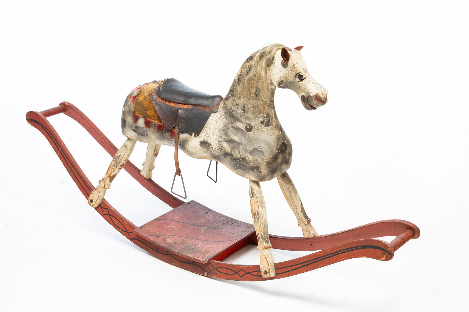 AMERICAN CARVED AND PAINTED WOOD ROCKING HORSE. (1 of 4)