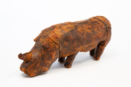 MANNER OF DIMITRI OMERSA (YUGOSLAVIAN-ENGLISH, 1927-1975) LEATHER RHINO FOOTSTOOL.