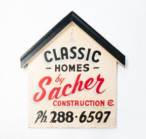 AMERICAN HAND-PAINTED ADVERTISING SIGN FOR SACHER CONSTRUCTION.