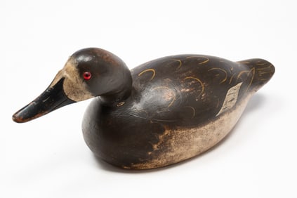 AMERICAN CARVED AND PAINT-DECORATED CANVASBACK HEN DUCK DECOY.