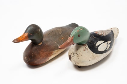 TWO AMERICAN CARVED AND PAINTED WORKING DUCK DECOYS.