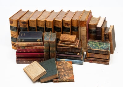 COLLECTION OF MOSTLY LEATHER BOUND BOOKS.