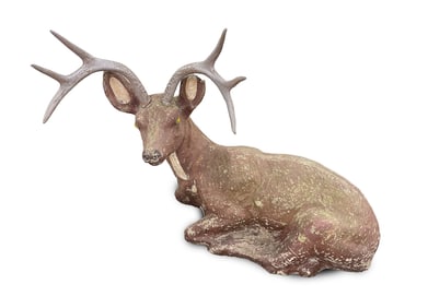 AMERICAN CEMENT RECUMBENT STAG YARD ORNAMENT.