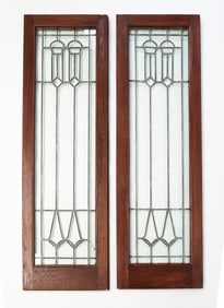 A PAIR OF AMERICAN LEADED GLASS DOORS.