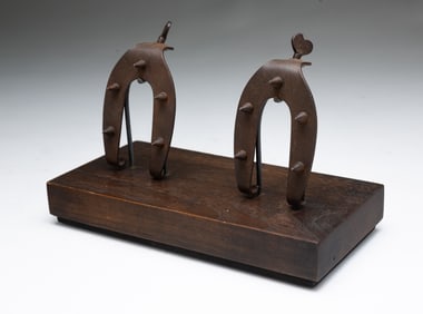 AMERICAN FORGED IRON LADIES HEEL CLEATS.