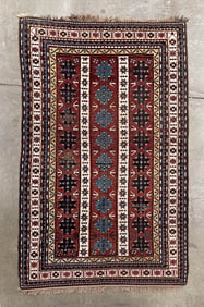 KAZAK AREA RUG.