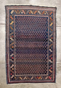 CABISTAN AREA RUG.