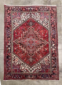 HERIZ ROOM SIZED RUG.