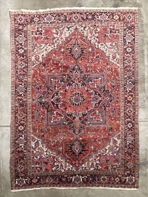 HERIZ ROOM SIZED RUG.