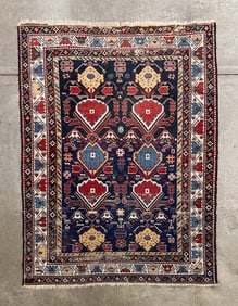 CAUCASIAN AREA RUG.