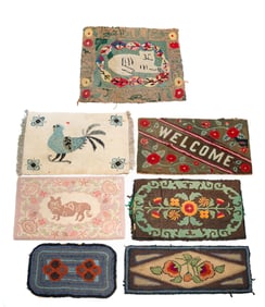 SEVEN AMERICAN HOOKED SCATTER RUGS.