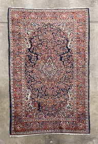 KASHAN AREA RUG.