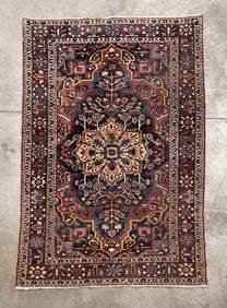 PERSIAN BAKHTIAR AREA RUG.
