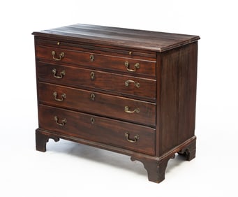 GEORGE III MAHOGANY FOUR-DRAWER BEDSIDE CHEST WITH BRUSHING SLIDE.