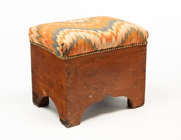 AMERICAN PINE BOX STOOL IN FLAME STITCH-PATTERNED UPHOLSTERY.