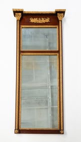 AMERICAN CLASSICAL MAHOGANY AND PARCEL-GILT MIRROR.