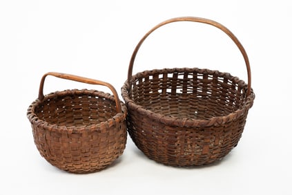 TWO AMERICAN WOVEN SPLINT BASKETS WITH BENTWOOD HANDLES.