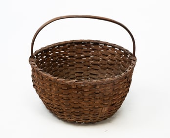 LARGE WOVEN SPLINT BASKET WITH BENTWOOD HANDLE.