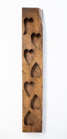 AMERICAN CARVED WALNUT SEVEN-HEART MAPLE SUGAR MOLD.
