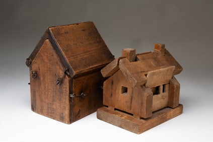 TWO AMERICAN MAPLE SUGAR MOLDS IN THE FORM OF SUGAR SHACKS.