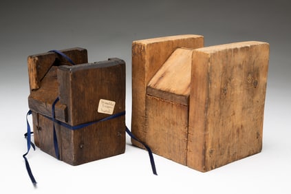TWO AMERICAN MAPLE SUGAR MOLDS IN THE FORM OF SUGAR SHACKS.