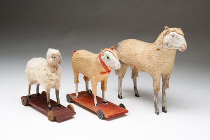 THREE SHEEP TOYS.