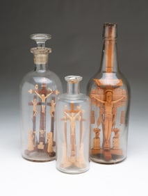 THREE AMERICAN FOLK ART CRUCIFIXION BOTTLE WHIMSEYS.