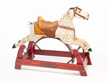 AMERICAN CARVED AND PAINTED WOOD ROCKING HORSE ON GLIDER BASE.
