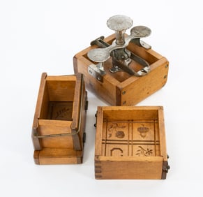 THREE CASED BUTTER MOLDS WITH HARDWARE.