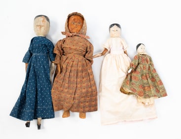 FOUR PAINT DECORATED WOODEN DOLLS.