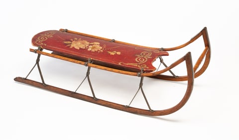 AMERICAN PAINT-DECORATED WOOD AND STEEL SLED WITH FLORAL MOTIF.