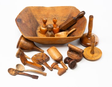 HANDLED WOODEN BOWL WITH KITCHEN UTENSILS.