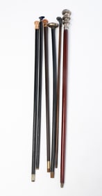 GROUP OF SIX WALKING STICKS, INCL. PRESENTATION AND AGATE-MOUNTED EXAMPLES.