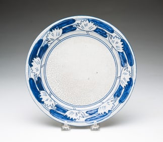 DEDHAM POTTERY (DEDHAM, MASSACHUSETTS) LOTUS PATTERN PLATE.