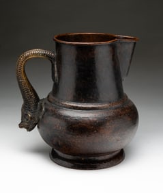 ATTRIBUTED TO STICKLEY BROTHERS (GRAND RAPIDS, MICHIGAN) ARTS AND CRAFTS HAMMERED COPPER PITCHER