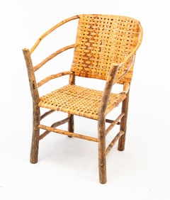 OLD HICKORY (SHELBYVILLE, INDIANA) RUSTIC BRANCH AND TWIG ARMCHAIR.